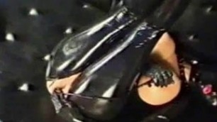 masked girl in latex gets anal training