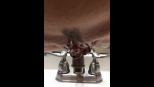 Swinginmilf uses a Sink to Drain her Sweet Pussy of Piss